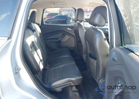 2014 Ford Escape Titanium z USA, uszkodzony, nr VIN 1FMCU0J99EUB40185